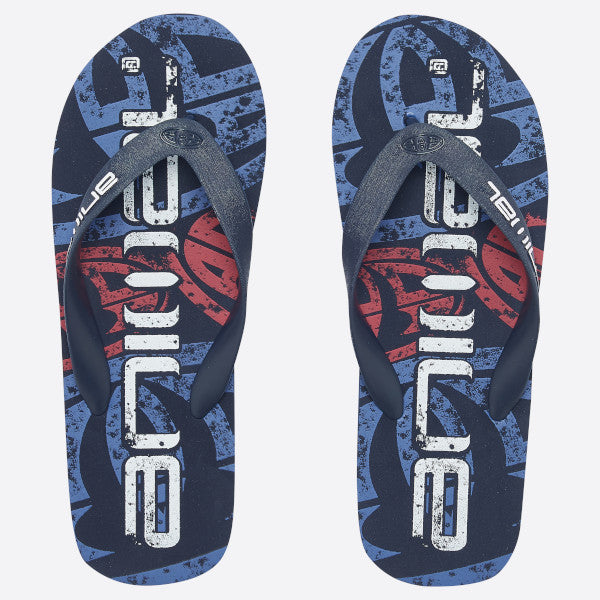 A pair of Animal flip-flops with a dark blue and black graphic design, featuring a large distressed white 'Animal' logo and a red graphic accent on the footbeds.